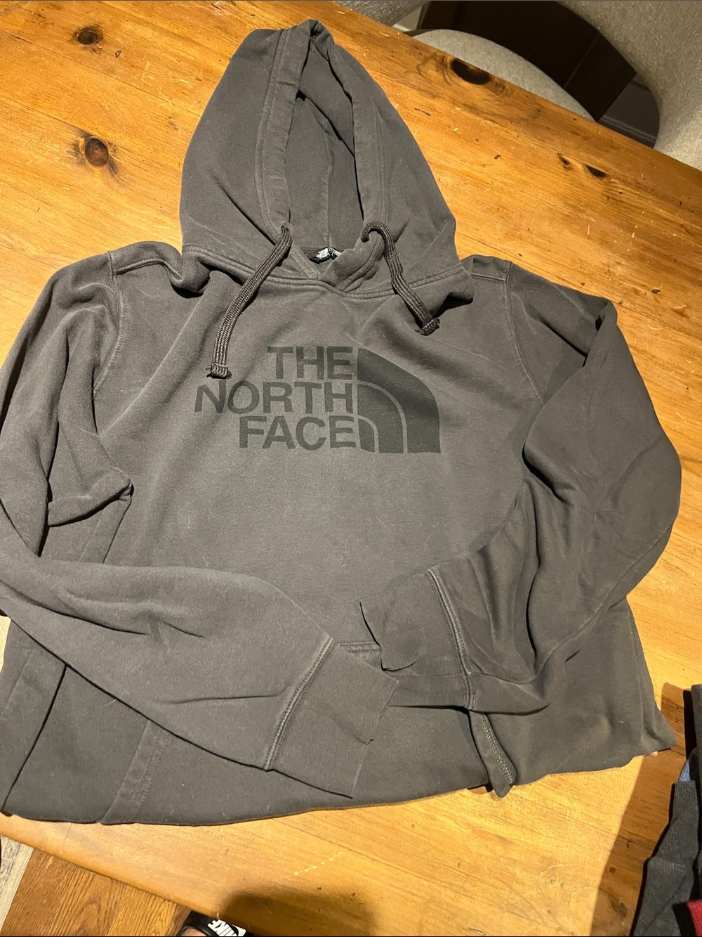 The North Face Men's Pullover Hoodie in Dark Gray with Logo